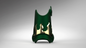 A dark green 3D-printed protective guard or stand with a gold flame-shaped cutout detail, shown on a neutral gray gradient background.