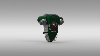 A futuristic, dark green V.10 Fire Lizards Backpack Cover Detail V.1 (3D Print | Files Only), featuring metallic accents, vents, and a circular black center with gold details, floats like a robotic accessory against a simple gray gradient background.