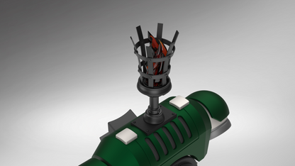 A 3D-rendered green and black futuristic handheld device with a cylindrical body, ribbed grip details, white rectangular buttons, and a black top-mounted basket-like component containing red and orange flame-like elements, shown on a gray gradient background.