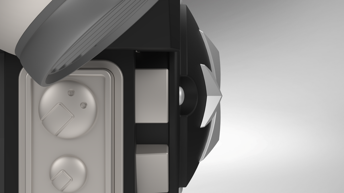 Close-up of the V.10 Grim Paladins Backpack Cover Detail V.1 (3D Print | Files Only), featuring a circular star-shaped component, a partial metallic lid, and two dials or buttons on a gray panel—elements that echo the intricate design language of Tactical Grim Paladins gear. The background is gradient gray.
