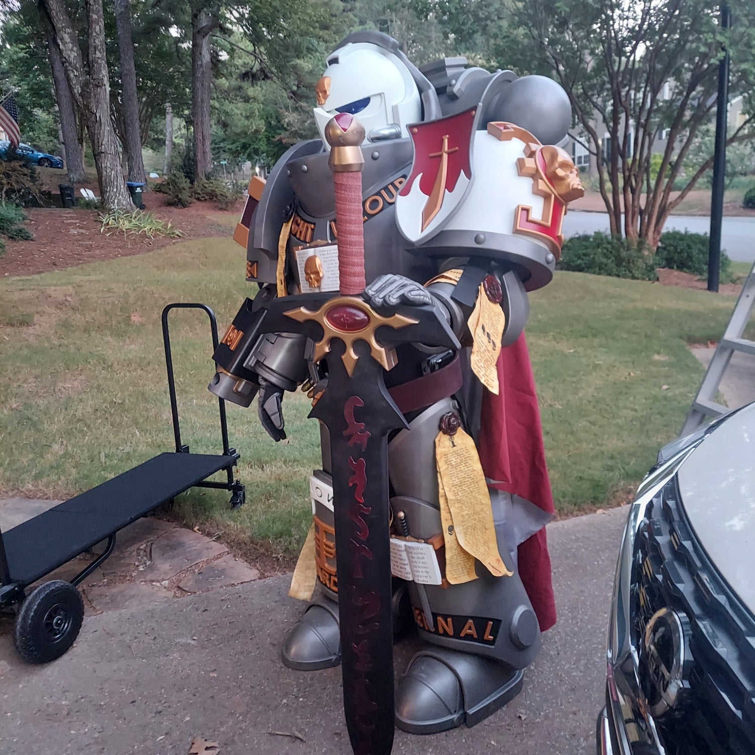 A printed model of a suit of armor designated as Silver Squires Warden armor, displayed outdoors.