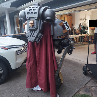 A printed model of a suit of armor designated as Silver Squires Warden armor, displayed outdoors.