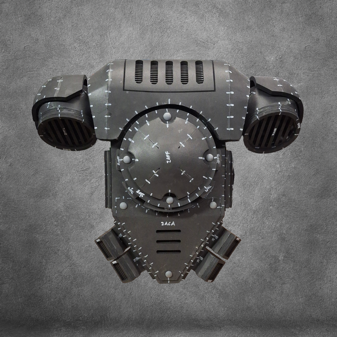 Displayed against a gray concrete background, the V.10 Tactical Backpack Pattern stands out with its black, futuristic design featuring metallic panel details, vent accents, and crisp white stitching lines—echoing the signature style of the Galactic Warriors Tactical Remaster. This eye-catching piece demonstrates advanced EVA foam crafting techniques for an authentic sci-fi finish.