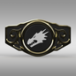 A black and gold belt buckle featuring a central circular medallion with a white dragon head emblem, set against a neutral gray gradient background.