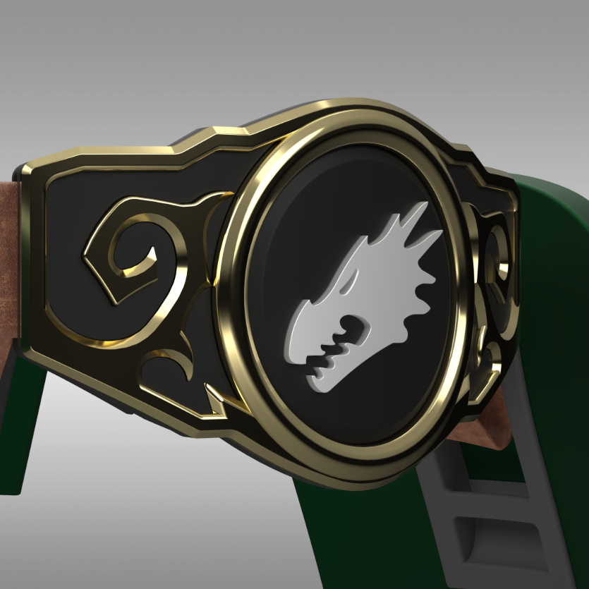 A close-up of a decorative belt buckle or watch strap component with a black center, gold-toned metal border, and a silver dragon head emblem. The surrounding structure includes dark green and brown elements, shown against a gray gradient background.