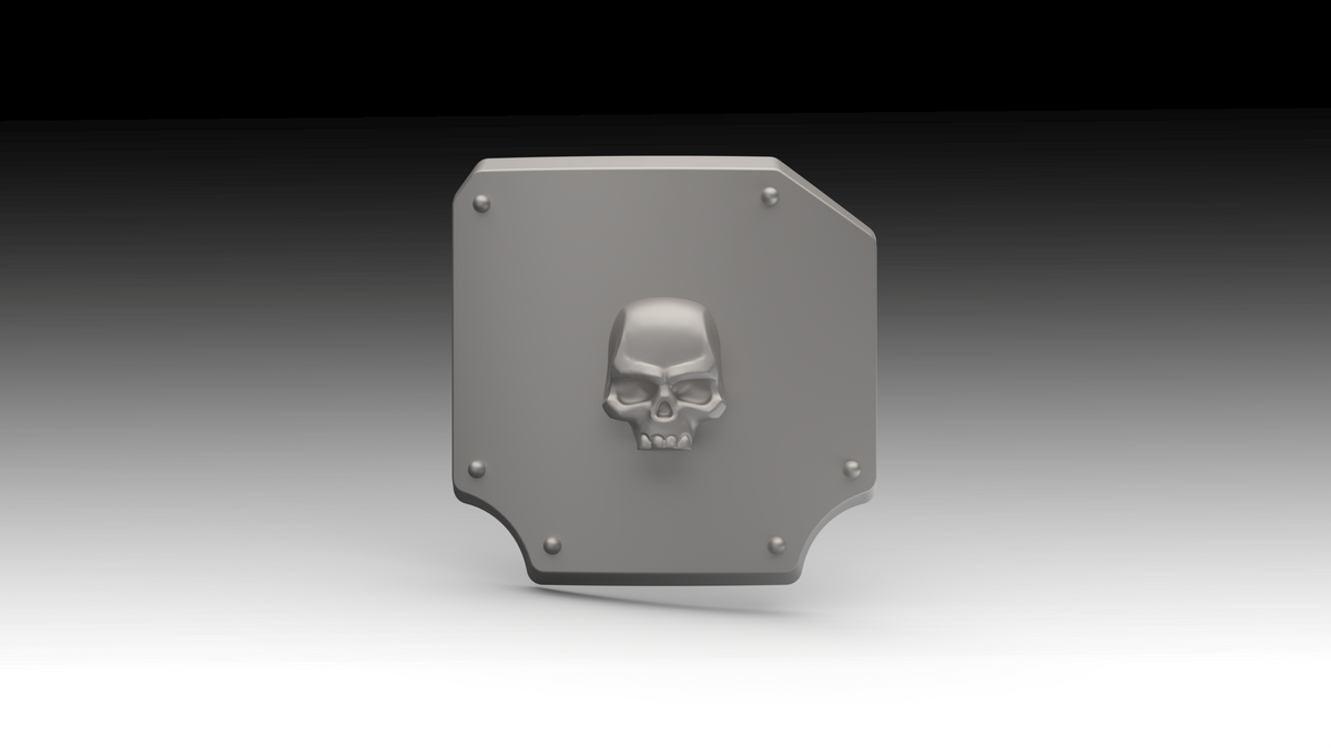 A gray 3D-printed shield-shaped object with a raised skull emblem in the center and four screw details at the corners, shown against a black-to-white gradient background.