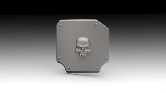 A gray 3D-printed shield-shaped object with a raised skull emblem in the center and four screw details at the corners, shown against a black-to-white gradient background.