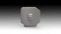 A gray 3D-printed shield-shaped object with a raised skull emblem in the center and four screw details at the corners, shown against a black-to-white gradient background.