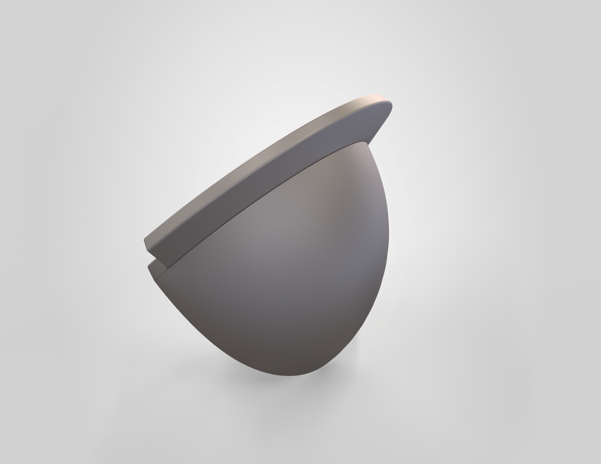 A sleek, gray, half-spherical form with a flat, angled top surface—evocative of the V.10 3D Printed Knee V1.0 design—is positioned against a simple light background. The overall aesthetic is modern and minimalistic.