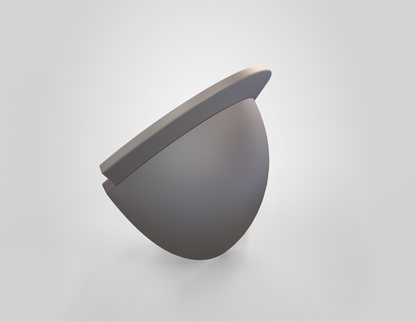 A sleek, gray, half-spherical form with a flat, angled top surface—evocative of the V.10 3D Printed Knee V1.0 design—is positioned against a simple light background. The overall aesthetic is modern and minimalistic.