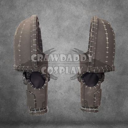 Pair of brown shoulder pads with black padding on a gray background, branded 'Crawdaddy Cosplay'.
