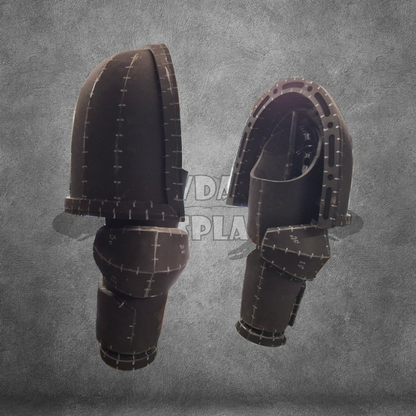 Pair of black leather knee pads on a gray background