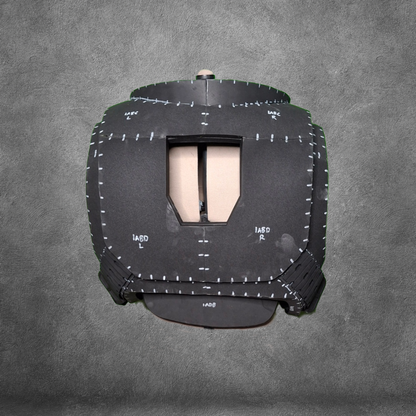 Presenting the V.10 Tactical Chest Pattern: a black protective vest with white stitching and labeled sections, inspired by the iconic Galactic Warriors chest design and displayed against a gray textured background. Ideal for cosplay or crafting projects, this digital download provides you with an EVA foam template, making it simple to recreate detailed armor at home.