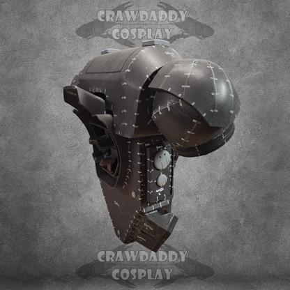 Cosplay helmet with intricate design on a textured gray background, featuring the brand 'Crawdaddy Cosplay'.