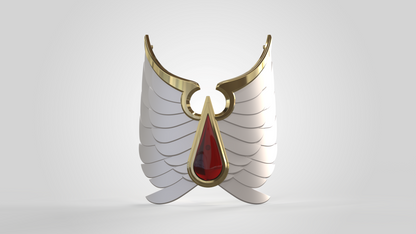 A golden winged brooch with white feathers and a large red gem in the center is displayed on a plain light background, showcasing subtle shin detail patterns inspired by the V.10 Crimson Celestials V.1 Shin Detail (3D Print | Files Only) design.