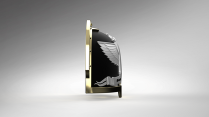 A sleek, black and gold shield stands upright, showcasing a silver wing and stylized flame across its curved surface—an impressive example of the V.10 Gloomy Celestials V.2 Shoulder Detail (3D Print | Files Only) from the Tactical Remaster Arms Pattern—set against a plain gradient background. Perfect for digital download.