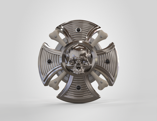 Metallic decorative object with skull design on a white background