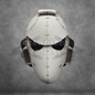 The Galactic Warriors Universal Beaked Helmet Pattern is displayed against a textured gray background. With its white, futuristic design featuring black visor slits, stitching-like lines, and headphone-like ear coverings, this pattern is perfect for cosplay enthusiasts and also serves as excellent inspiration for an EVA foam helmet template or digital download project.