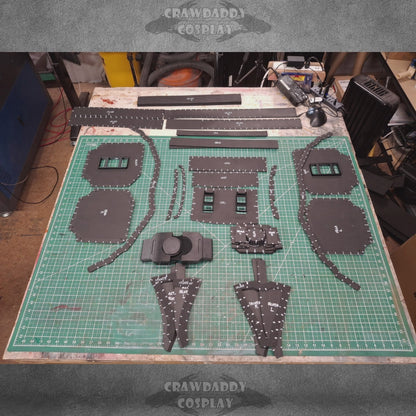 A montage of a Space Marine Mark X Tacticus waist being built.